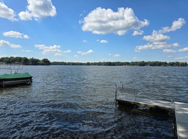 view of dock with a water view