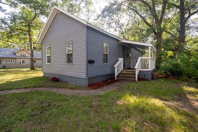 view of front of home featuring a front yard