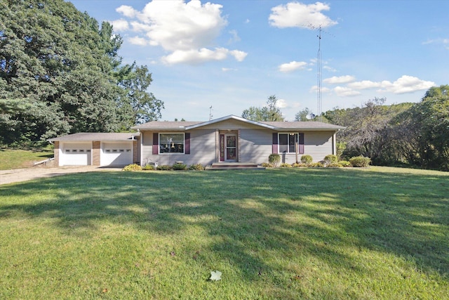 view of front of house featuring a garage and a front yard