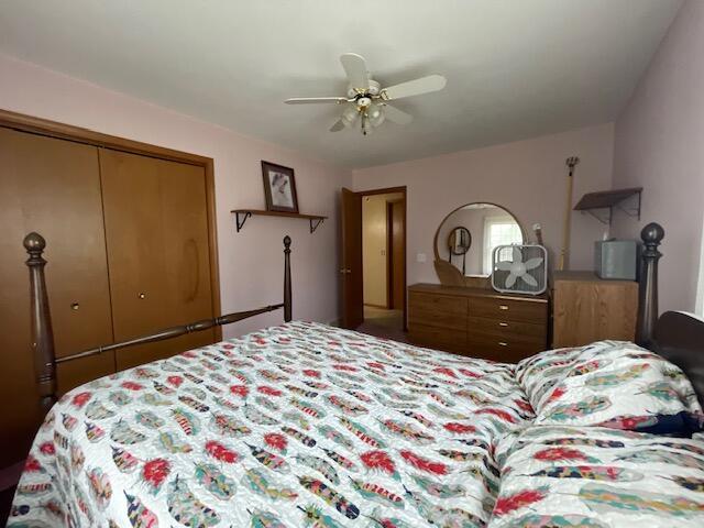 bedroom with a closet and ceiling fan