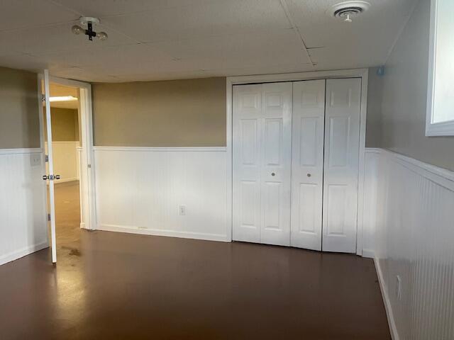 unfurnished bedroom with a closet