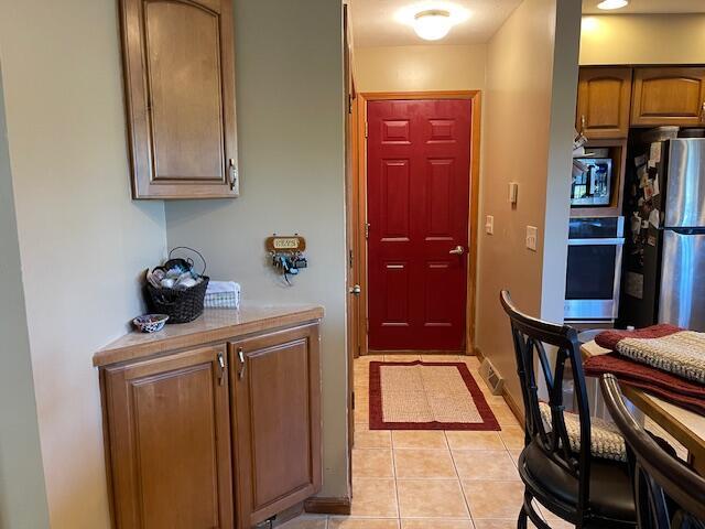 view of tiled foyer entrance