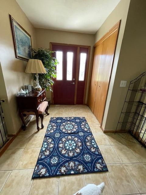 view of tiled foyer entrance