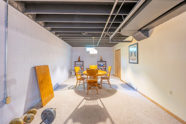 view of carpeted dining space