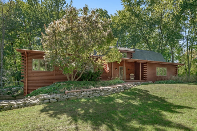 view of front of home with a front yard