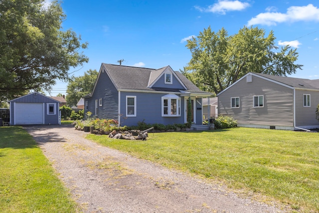 view of front of property with an outdoor structure, a garage, and a front yard