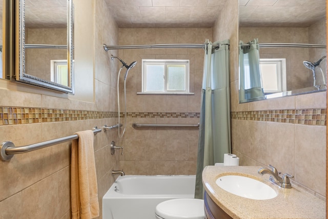 full bathroom featuring vanity, toilet, and shower / tub combo with curtain