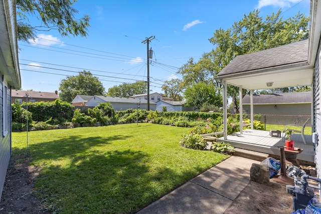 view of yard featuring a wooden deck