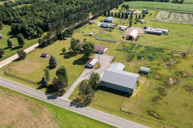 birds eye view of property featuring a rural view