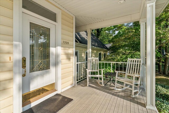 wooden terrace featuring a porch