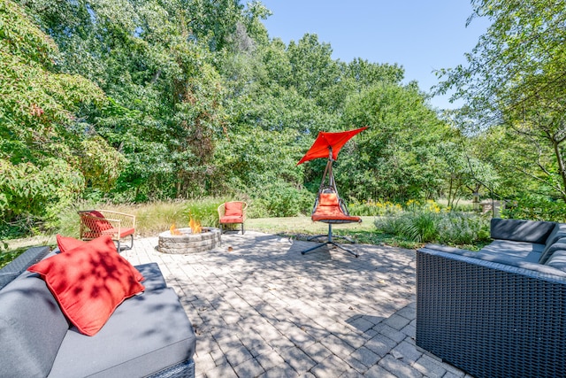 view of patio featuring an outdoor fire pit