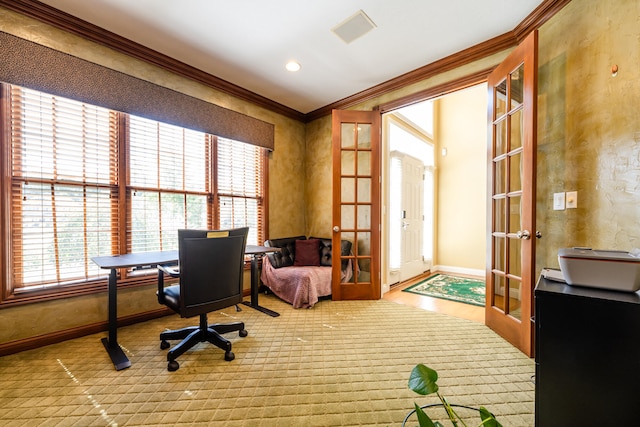 office with hardwood / wood-style flooring, ornamental molding, and french doors