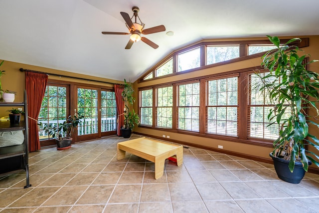 sunroom / solarium featuring lofted ceiling and ceiling fan