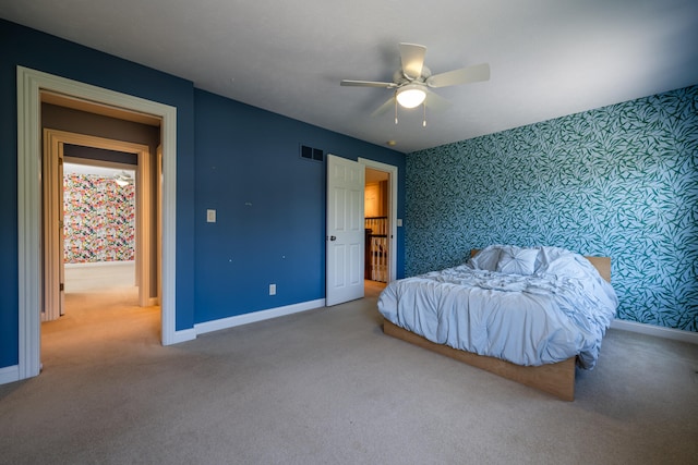 carpeted bedroom featuring ceiling fan