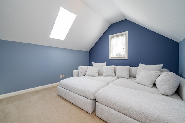 bedroom featuring carpet and lofted ceiling with skylight