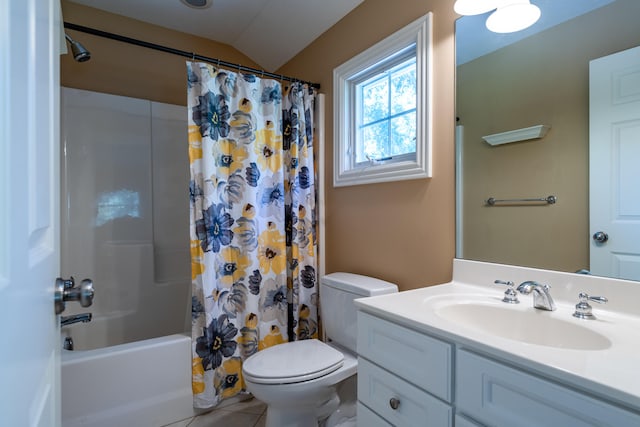 full bathroom featuring tile patterned flooring, vanity, toilet, and shower / bathtub combination with curtain