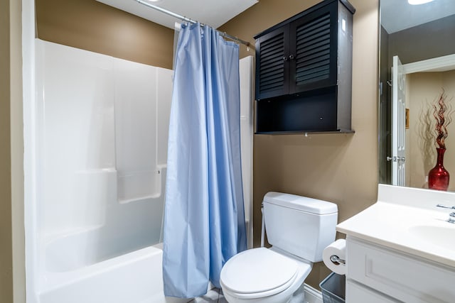 full bathroom featuring vanity, toilet, and shower / tub combo with curtain