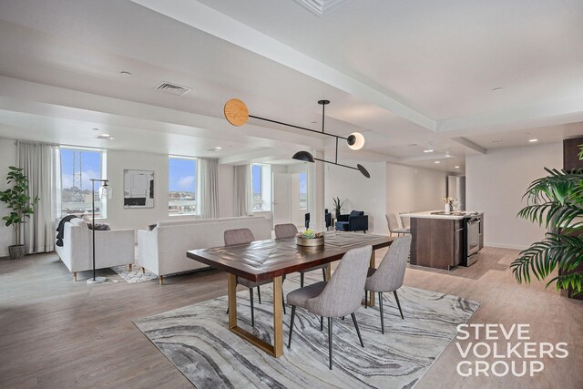 dining space featuring light hardwood / wood-style floors