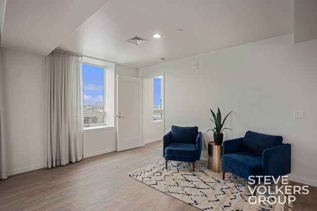 living area with light hardwood / wood-style floors