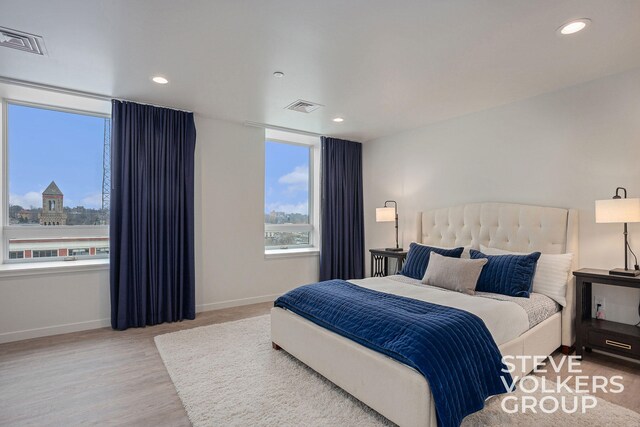 bedroom featuring light wood-type flooring