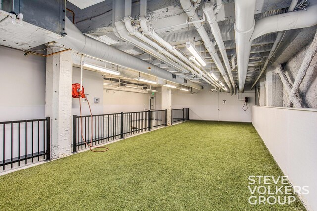 basement featuring carpet floors