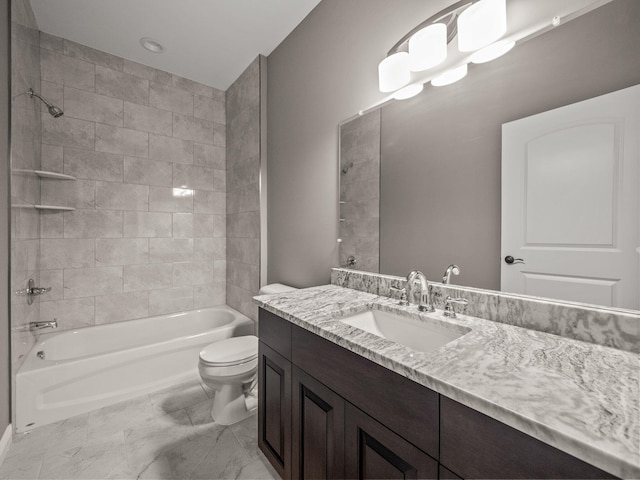 full bath with marble finish floor, shower / washtub combination, toilet, and vanity