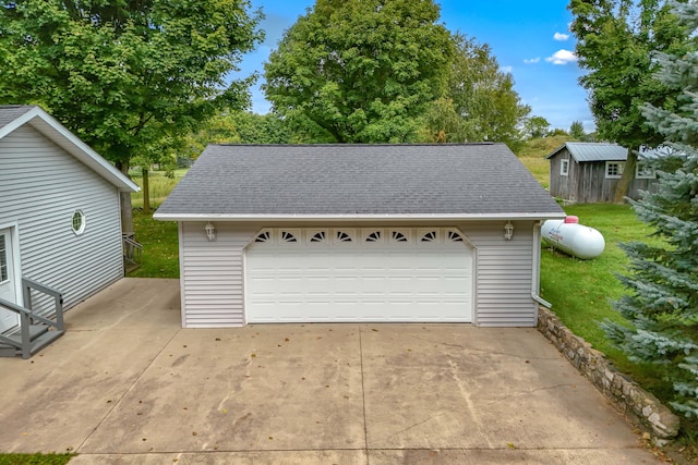 garage featuring a yard