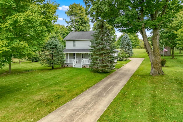 view of front facade featuring a front yard and a porch