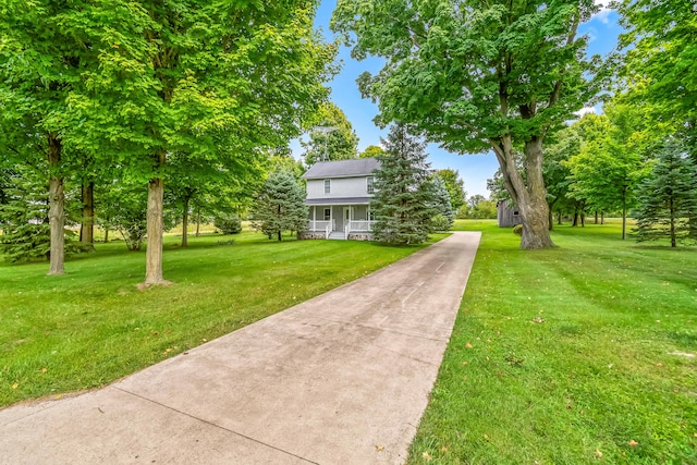 view of community featuring a yard