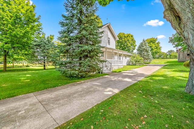 view of home's exterior featuring a lawn