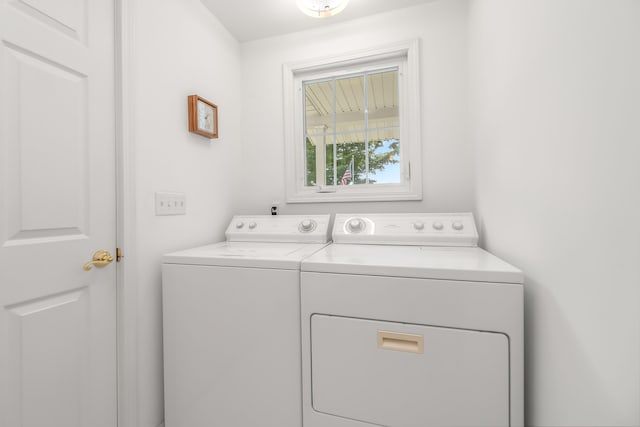 clothes washing area featuring washing machine and dryer