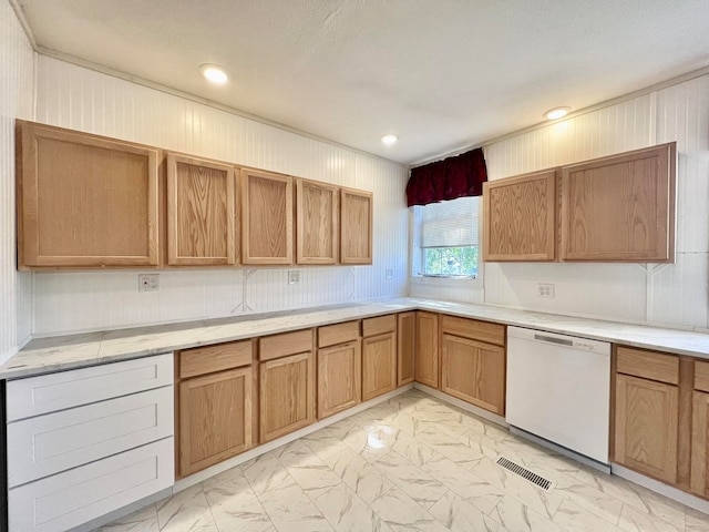 kitchen with a textured ceiling and dishwasher