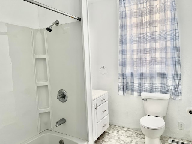 full bathroom featuring vanity, toilet, tile patterned flooring, and bathing tub / shower combination