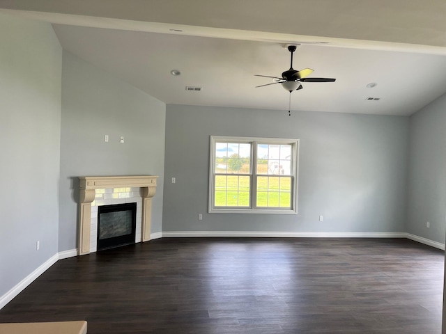 unfurnished living room with a fireplace, baseboards, dark wood-type flooring, and ceiling fan