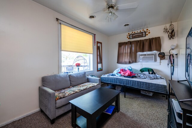 bedroom with dark colored carpet, cooling unit, and ceiling fan