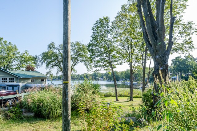 exterior space with a water view