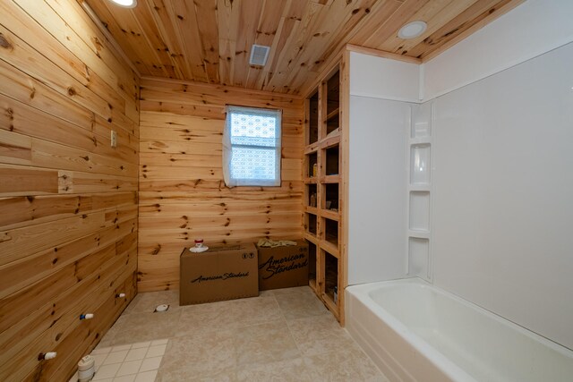 bathroom with wood walls, independent shower and bath, tile patterned flooring, and wooden ceiling