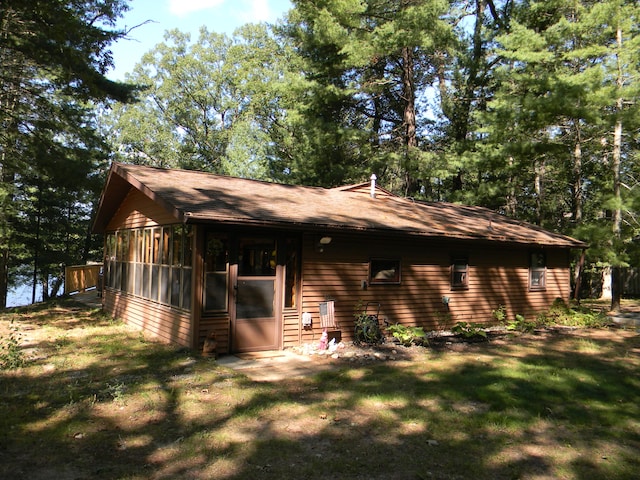 exterior space featuring a sunroom