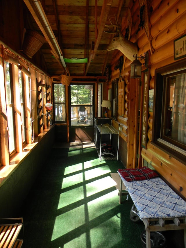 sunroom with vaulted ceiling