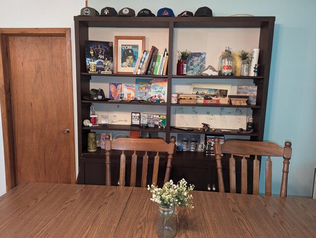 dining room with hardwood / wood-style flooring