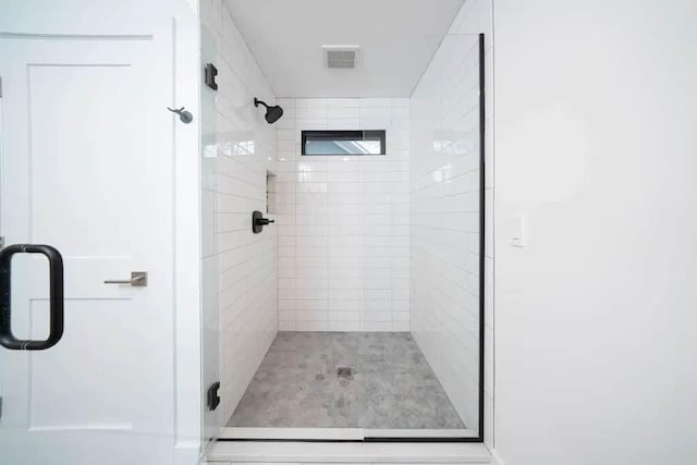 bathroom with an enclosed shower