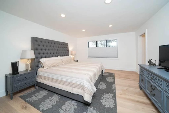 bedroom featuring light hardwood / wood-style flooring