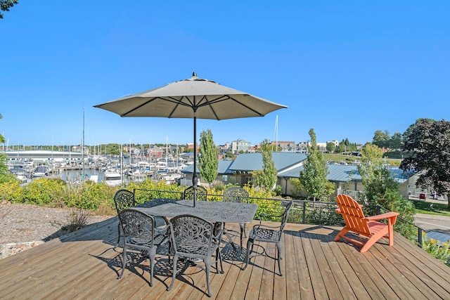 deck featuring a water view