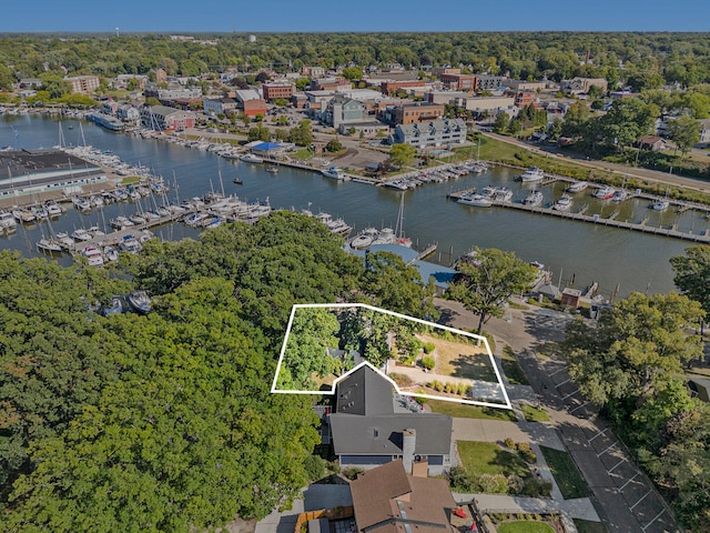 birds eye view of property featuring a water view