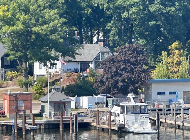 dock area featuring a water view