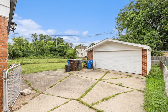 garage with a lawn