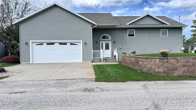 view of front of property featuring a garage