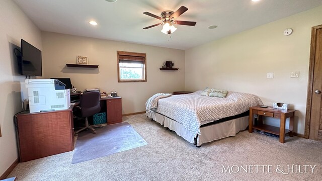 carpeted bedroom featuring ceiling fan