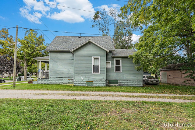 view of home's exterior with a yard