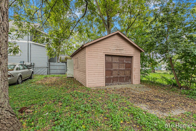 view of outdoor structure with a garage